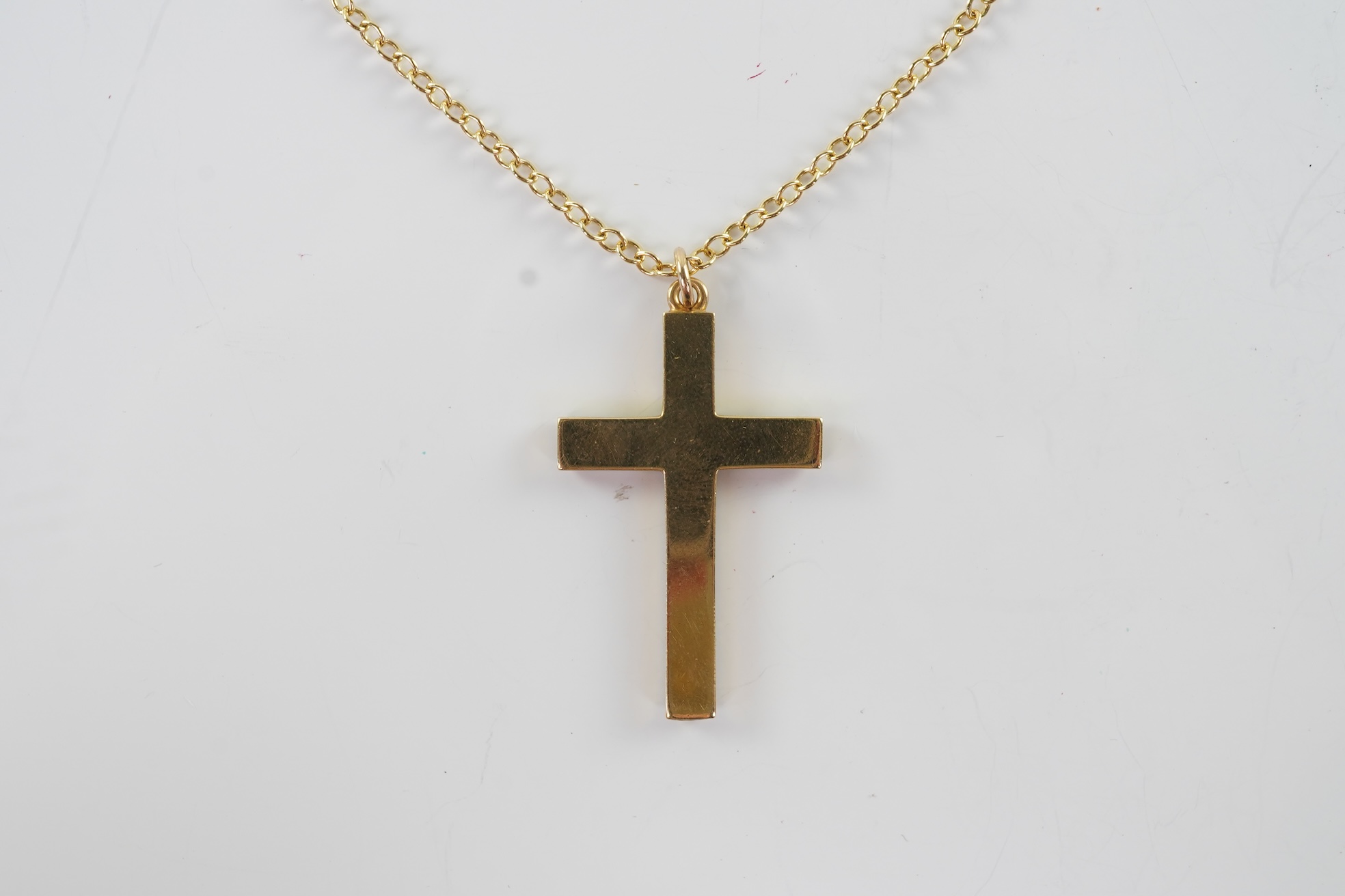 An Edwardian pearl and enamel cross and chain, early 20th century